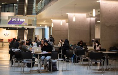 Several Students Gathered At The HUB's Main Lounge