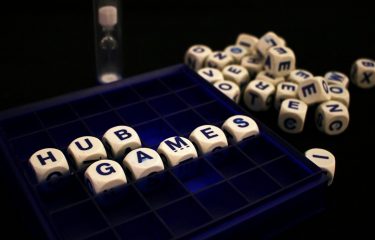 Cubes With Letters Spelling Out HUB Games