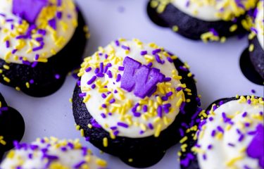 Cupcakes with purple and gold sprinkles