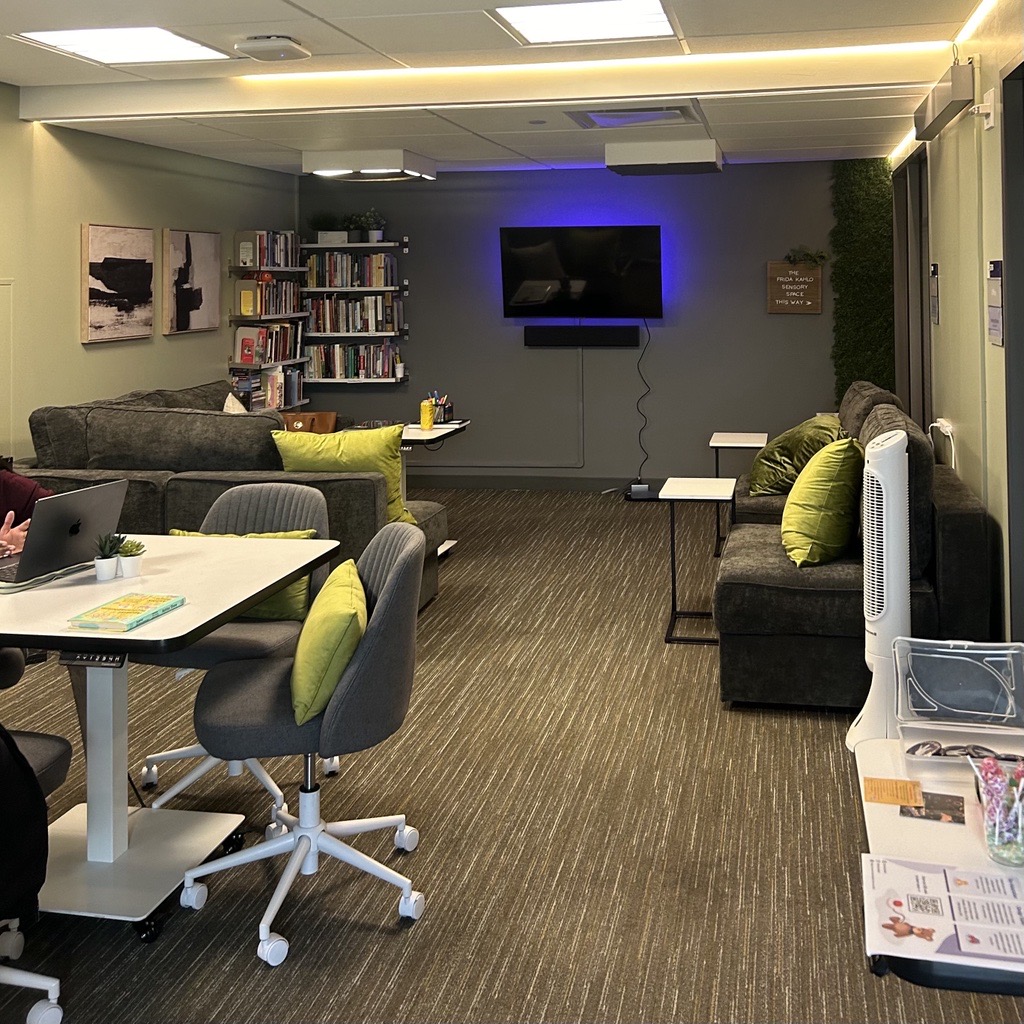 Picture of the interior of the D Center showing the front desk and lounge area